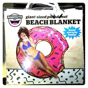 Giant pink donut beach blanket
